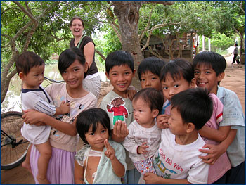 With children along the Mekong River